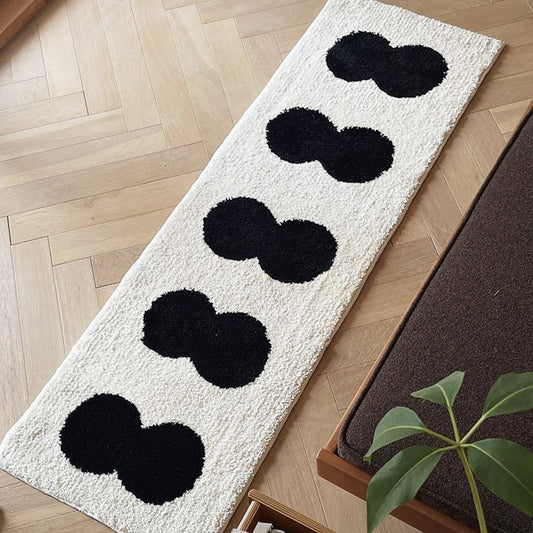 Narrow Abstract Rug in Black and White Design