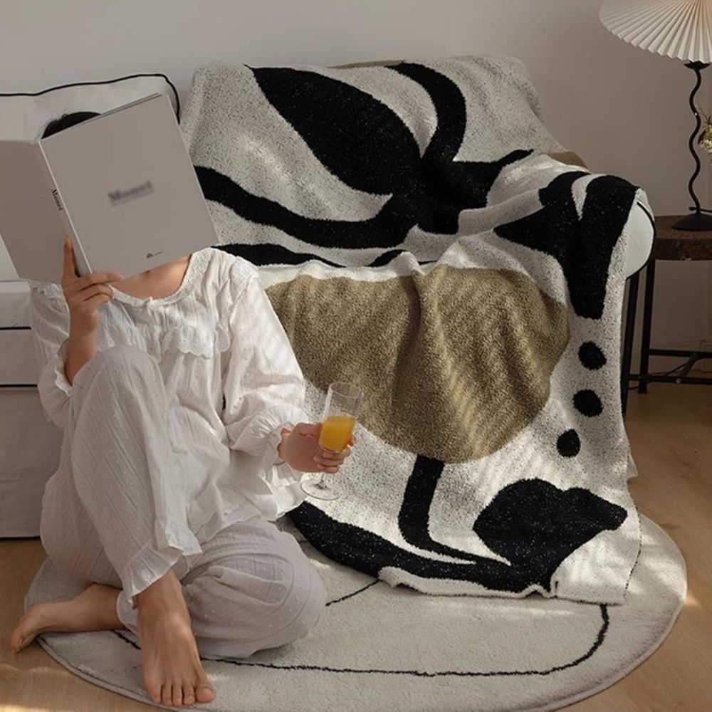 Embrace Comfort with the CozyNest Soft Throw Blanket