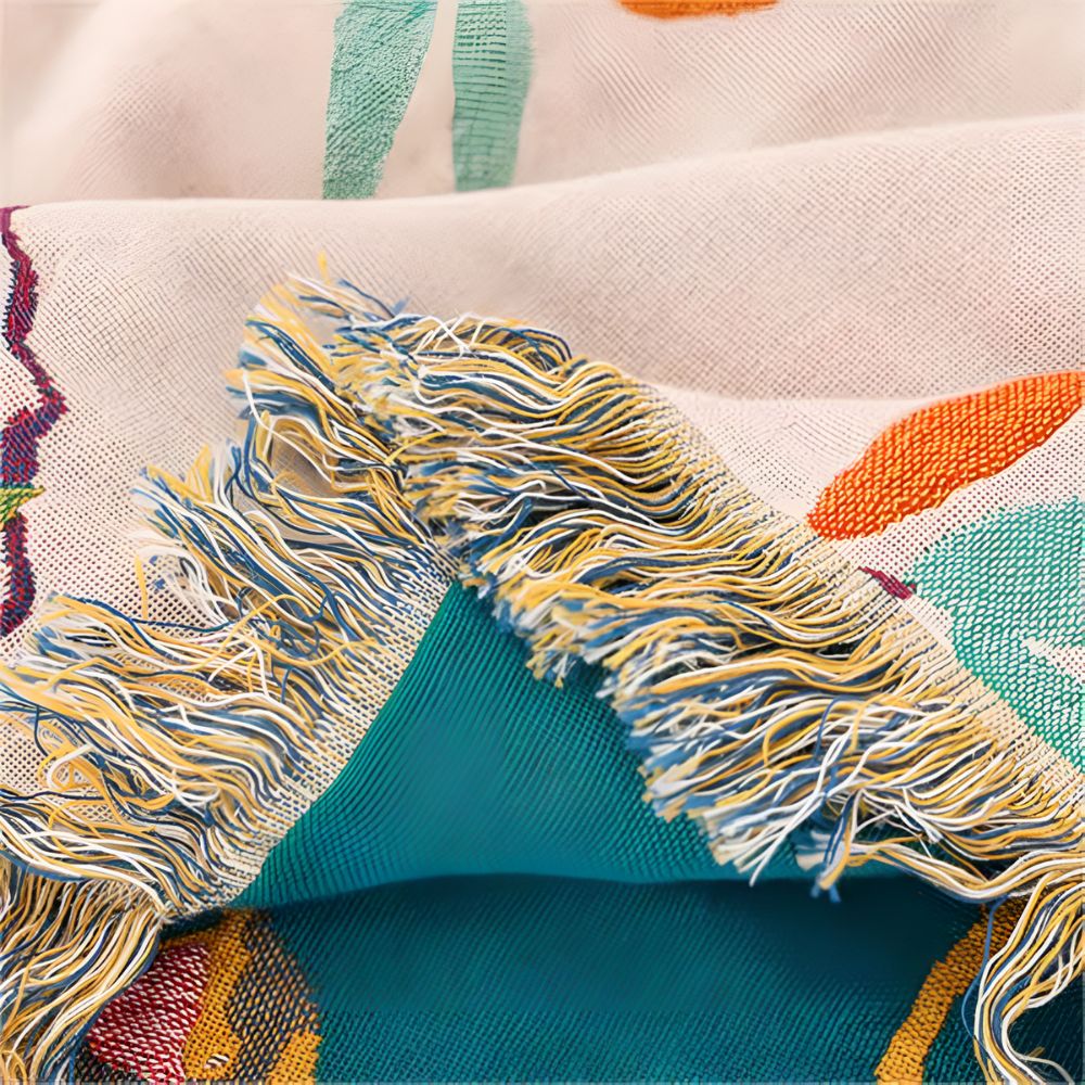Charming Avian Cotton Throw with Stylish Tassels