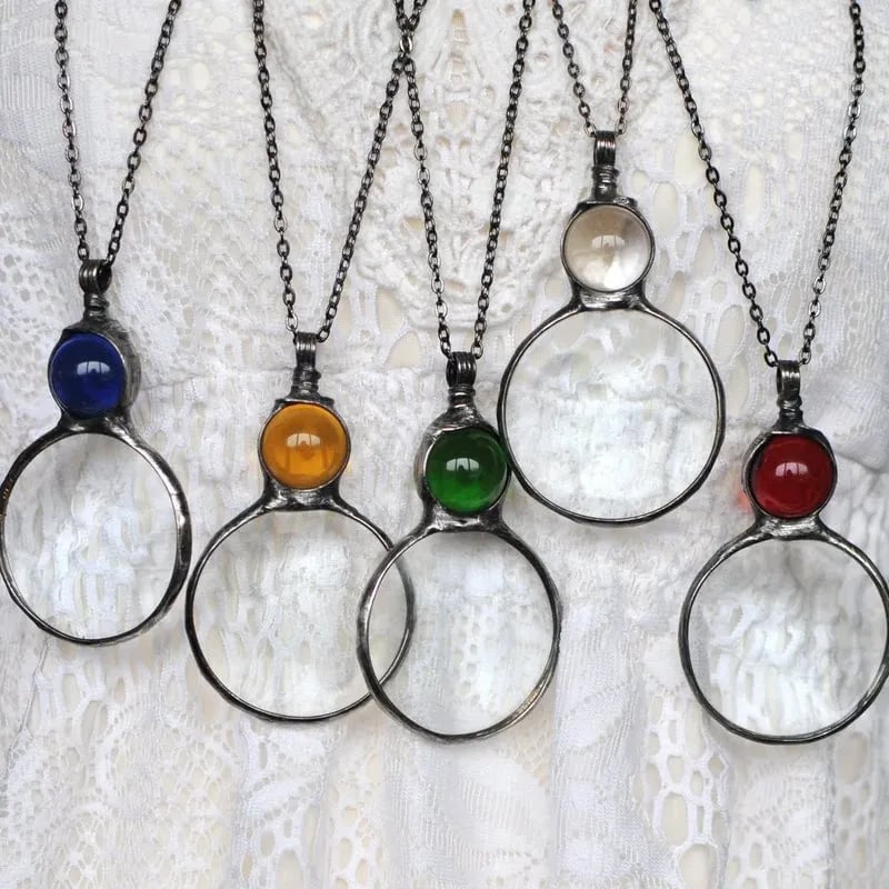 Necklace Featuring a Magnifying Pendant