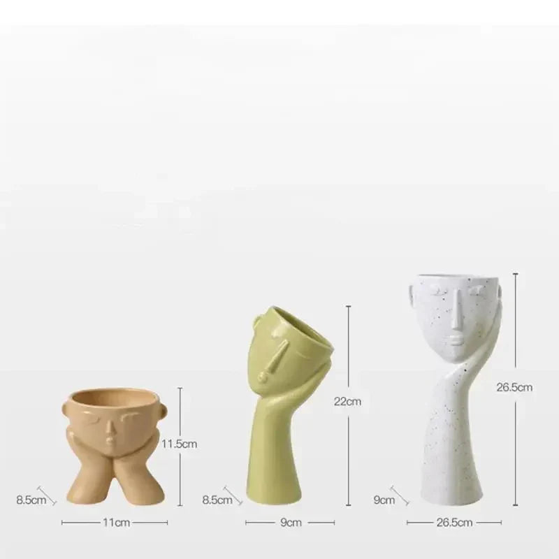 Contemporary Ceramic Vase Featuring Abstract Human Face Design