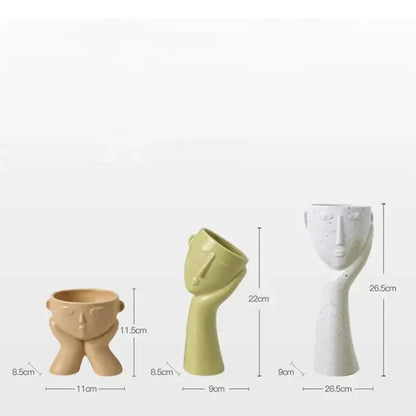 Contemporary Ceramic Vase Featuring Abstract Human Face Design
