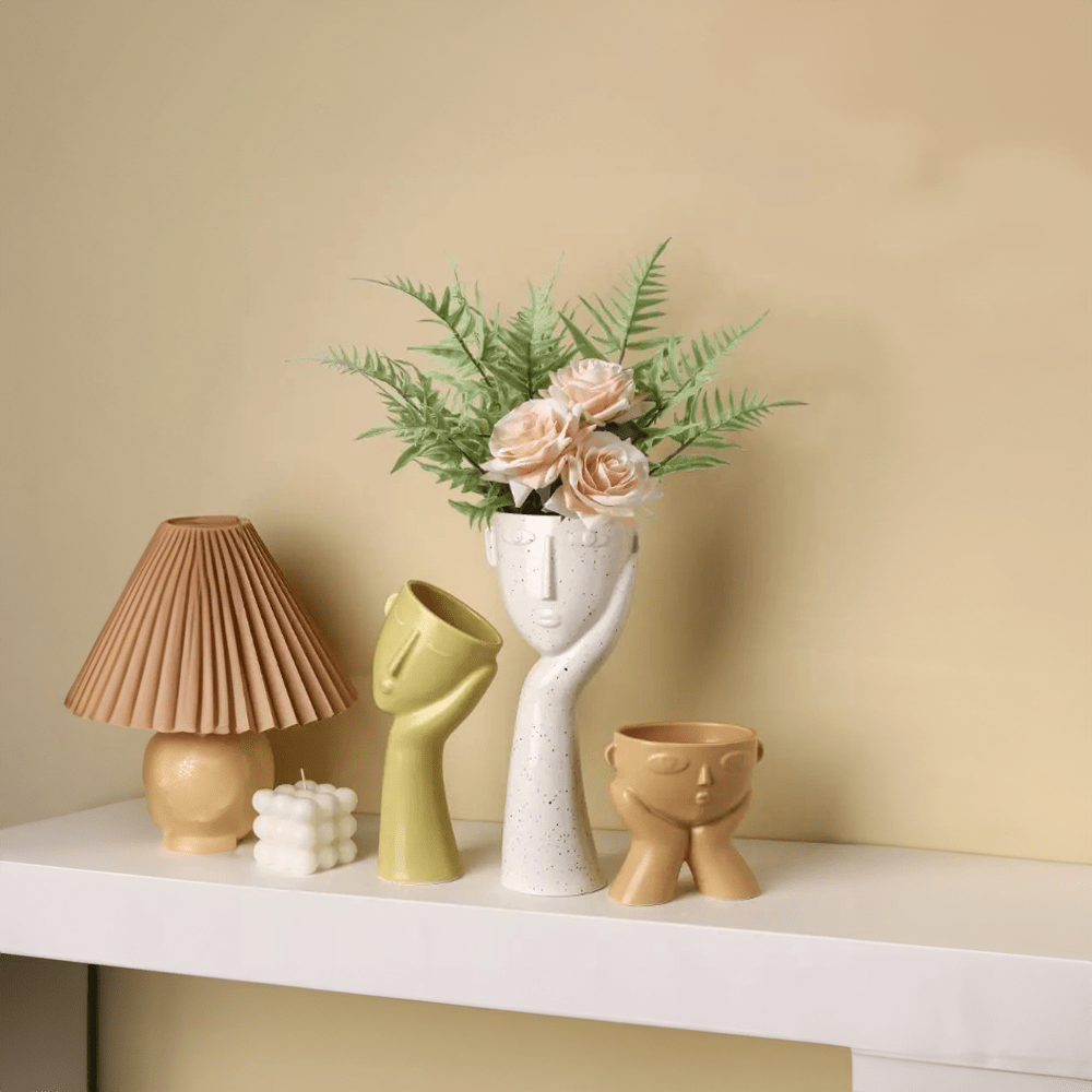 Contemporary Ceramic Vase Featuring Abstract Human Face Design