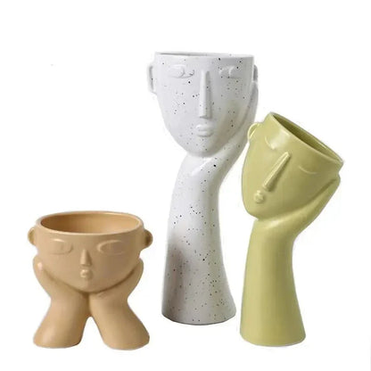 Contemporary Ceramic Vase Featuring Abstract Human Face Design
