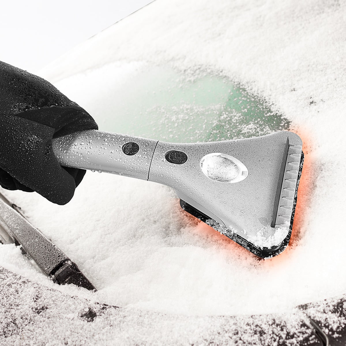 Winter Shield Pro: Heated Ice Scraper with Extendable Reach & LED Light
