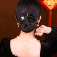 Black flower with butterfly