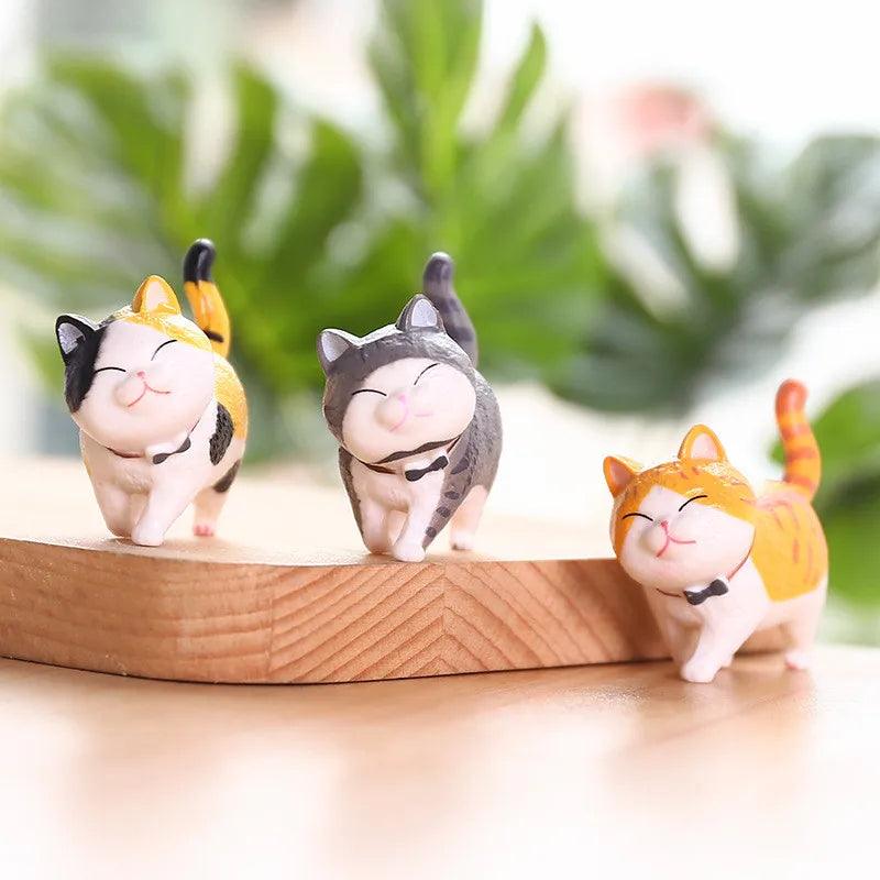 Charming Cat Figures to Brighten Any Environment Instantly