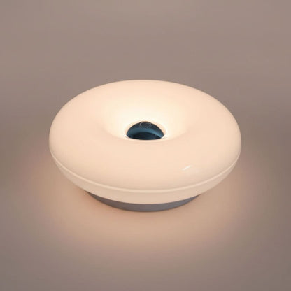Orange Donut Shaped Lamp for Contemporary Ambient Illumination