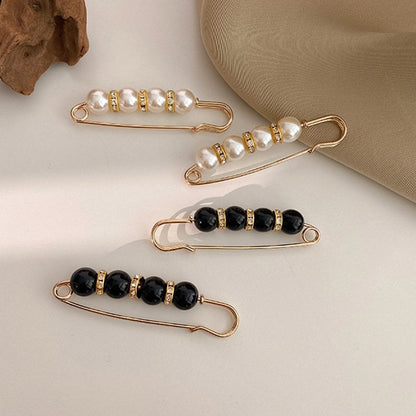 Radiant Elegance – Stunning Brooch with Crystals and Pearls