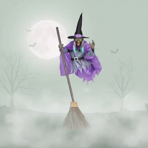 Lifesize Enchanted Witch with Glowing Eyes and Broomstick