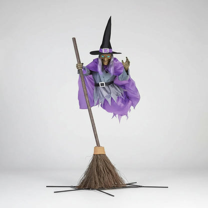 Lifesize Enchanted Witch with Glowing Eyes and Broomstick
