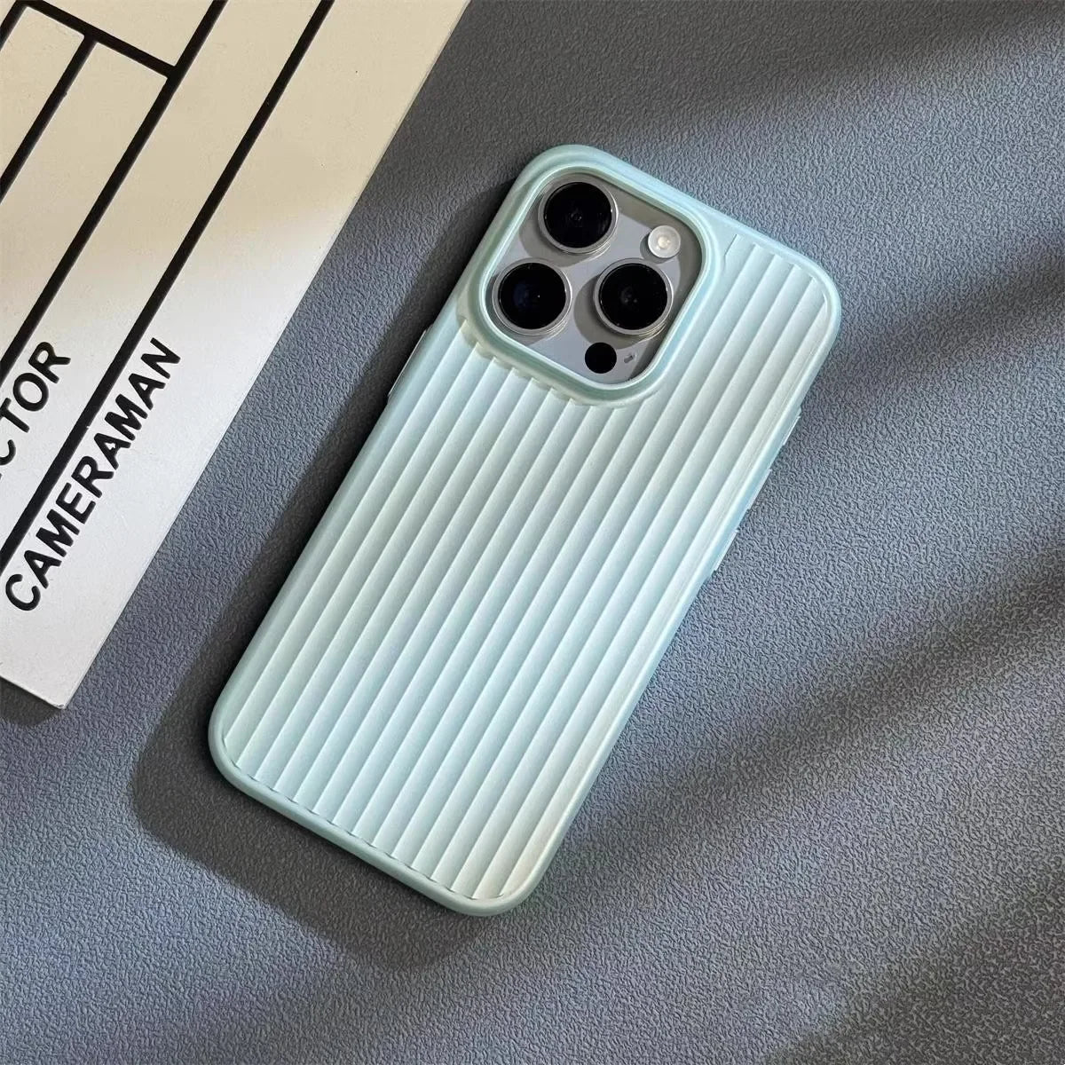 Luggage-Style Phone Case with Textured Grip, Camera Bump Protection, Slim Fit for Wireless Charging