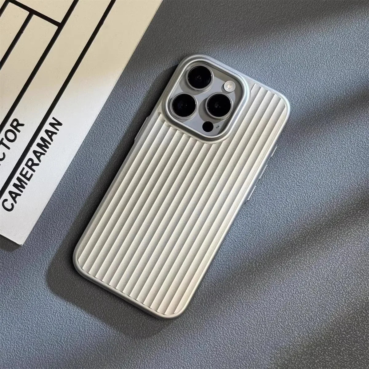 Luggage-Style Phone Case with Textured Grip, Camera Bump Protection, Slim Fit for Wireless Charging