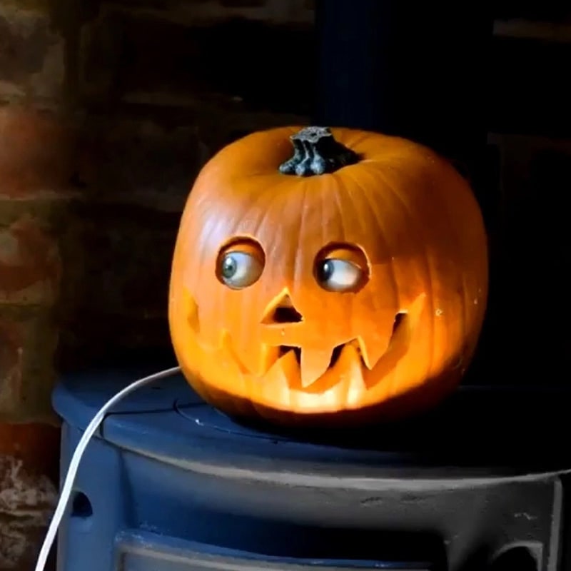 Animated Spooky Pumpkin with Lifelike Moving Eyes for Halloween Fun