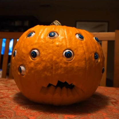 Animated Spooky Pumpkin with Lifelike Moving Eyes for Halloween Fun