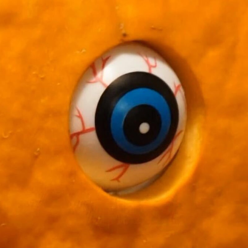 Animated Spooky Pumpkin with Lifelike Moving Eyes for Halloween Fun