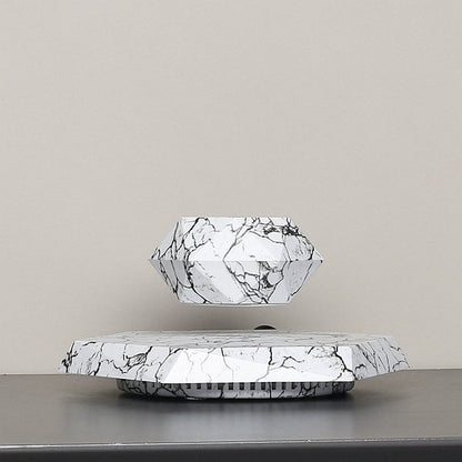 Floating Planter with Elegant Marble Base and 360-Degree Rotation