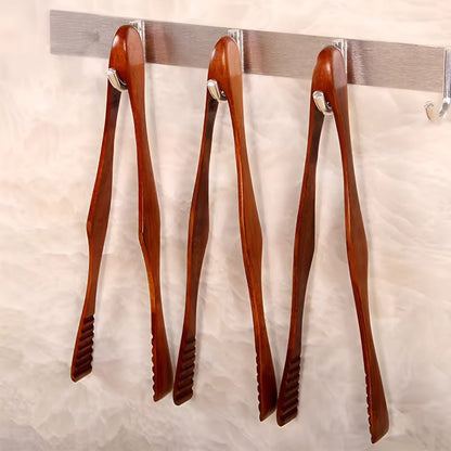Wooden Tongs for Cooking in the Kitchen