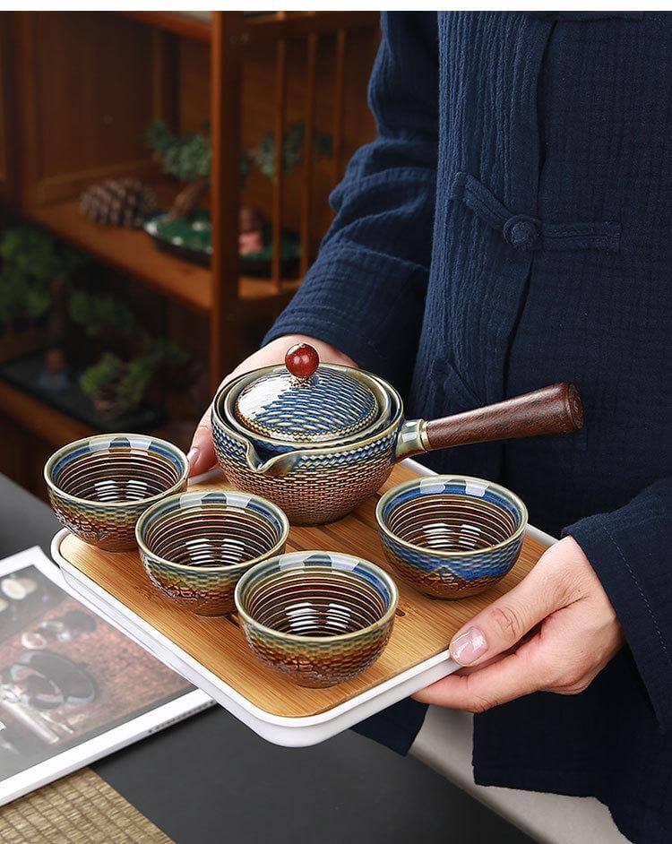 Moving Teapot Filter Set in Unique Ceramic Design
