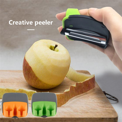 Double-Ended Vegetable Peeler for Two Fingers