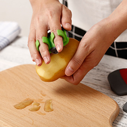 Double-Ended Vegetable Peeler for Two Fingers