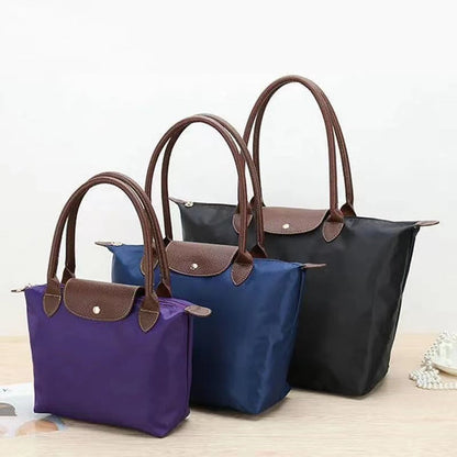 Timeless Design Handbag with Luxurious Handles