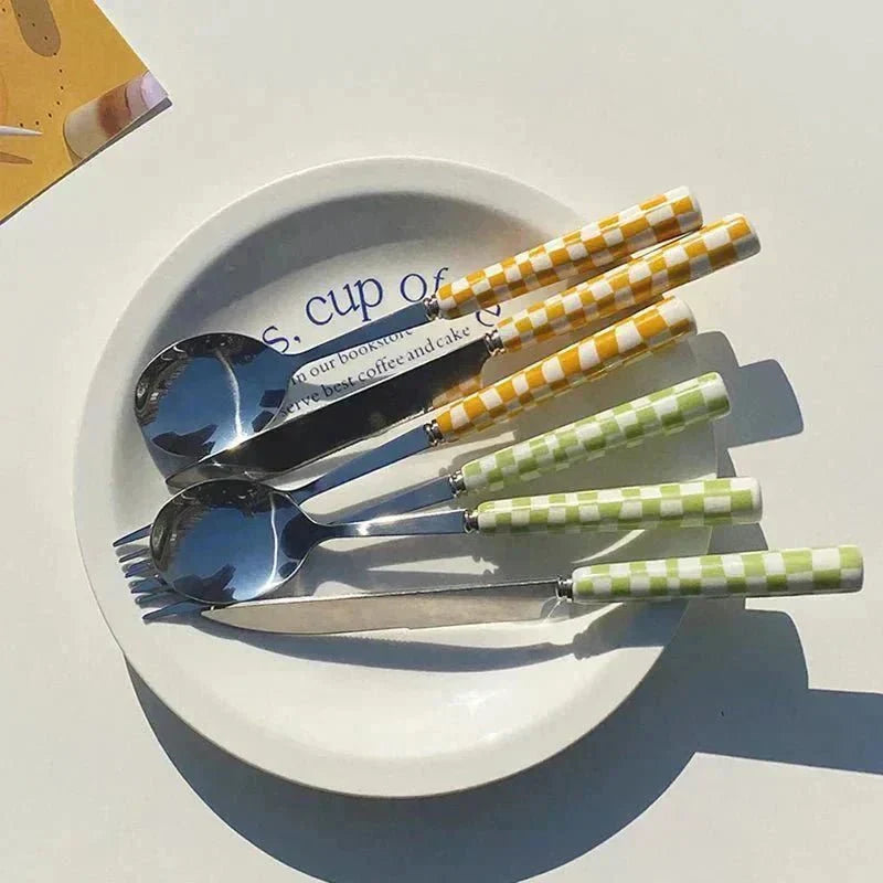 Elegant Tableware Set with Steel Cutlery and Ceramic Handles