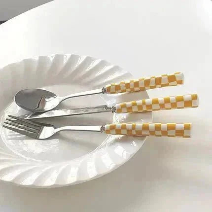 Elegant Tableware Set with Steel Cutlery and Ceramic Handles