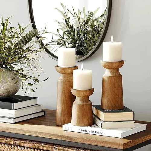 Elegant Trio of Wooden Candle Stands with Tapered Design