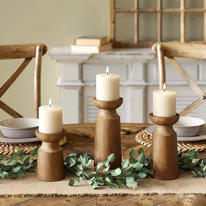 Elegant Trio of Wooden Candle Stands with Tapered Design